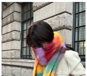 Colorful striped mohair scarf detail, closeup showing soft fluffy texture and vibrant rainbow hues.