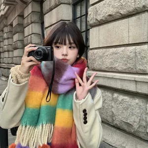 Colorful rainbow mohair winter scarf with tassels and pom-poms, oversized and thick warm.