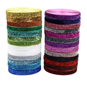 Colorful glitter elastic ribbon rolls for sewing and DIY craft decoration supplies.
