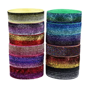 Colorful glitter elastic ribbon detail shot, shiny DIY craft webbing for hair bows and garment sewing.