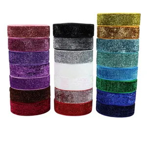 Colorful glitter elastic ribbon rolls for DIY crafts, clothing accessories, and hair bows.