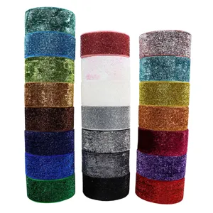 Colorful glitter elastic ribbons stacked for DIY hair bows and garment accessories decoration.