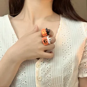 Halloween pumpkin ghost resin ring set, cute quirky holiday fashion jewelry accessory for women.