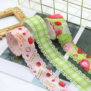 Strawberry hollow lace ribbon detail showing exquisite scalloped edge and cute fruit pattern.