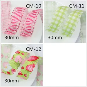 Detailed view of strawberry hollow lace ribbon, 30mm width DIY bow hair accessory material.