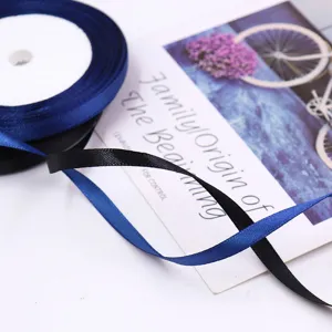 Satin ribbon spool roll dark blue and black fabric ribbon for gift wrapping and baking decoration.