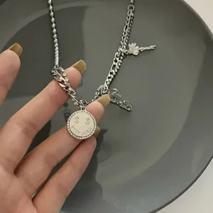 Stylish silver double layer rhinestone necklace with smiley coin pendant for women chic
