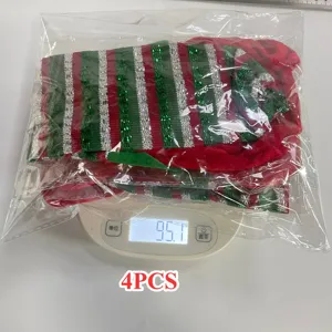 Christmas elf leg chair corner decoration cover, red and green striped festive table decor.