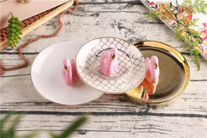 Ceramic flamingo jewelry tray detail view, gold painted ring dish for decor storage.