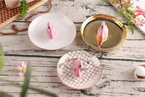 Nordic flamingo ceramic jewelry tray detail view, elegant gold rim ring storage dish.