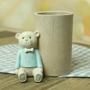 Cute cartoon bear resin pen holder, imitation wood grain desktop stationery organizer decor.