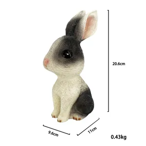 Leuke cartoon konijn spaarpot hars decoratief ornament met afmetingen voor de kinderkamer.