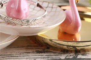 Nordic flamingo ceramic jewelry tray gold-painted ring storage plate and silver bangle decor.