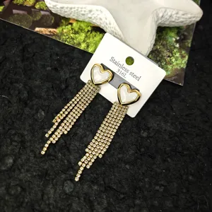 Detailed closeup of elegant heart shaped gemstone tassel stud earrings with stainless steel card.
