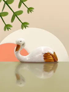 Detail view of the cute flamingo animal wall hook, adhesive sticky hanger for room decor.