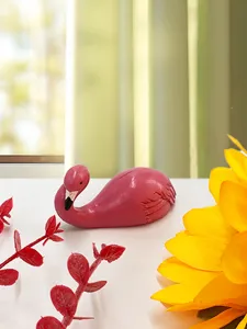 Pink flamingo shaped adhesive wall hook, cute animal sticky hook for home decor and hanging.