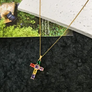Elegant colorful zirconia cross pendant necklace in gold tone fashion jewelry detail