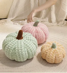Cozy soft plush pumpkin pillow detail showing fine textured fabric and charming natural colors.