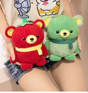 Close-up detail of cute vegetable plush bear toys, featuring soft fabric and colorful cute design.