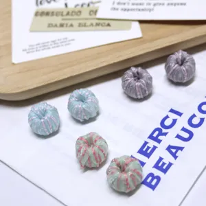 Fabric spacer beads for DIY jewelry making, handmade woven bracelet accessories, colorful craft charms.