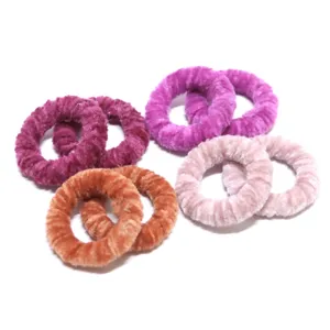 Set of colorful velvet hair scrunchies, soft plush elastic hair ties for women and girls.