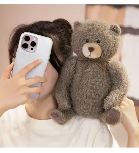 Cute plush brown teddy bear toy with soft textured fur and bow tie for kids and girls daily play.