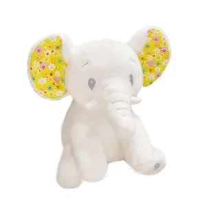 White plush elephant toy with yellow floral ears soft stuffed animal baby companion gift