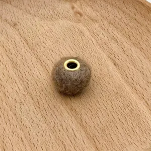 Brown felt plush bead with metal hole, ideal for handmade phone chain and bag jewelry charms.