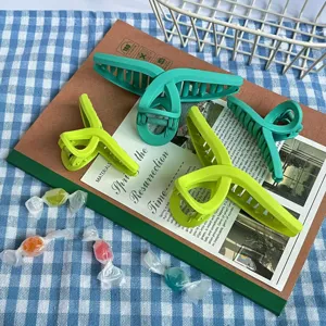 Matte small cross hair claw clip, cute macaron green hair jaw clamp for sweet styling.