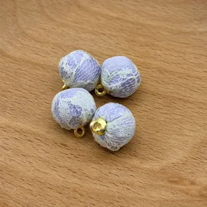 Lavender lace fabric wrapped ball charms for DIY jewelry making crafts and clothing accessories.