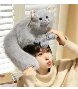 Close-up of the fluffy gray cat plush toy, showing soft fur texture and cute simulation style