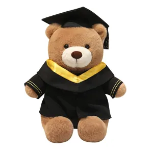 Afstudeer teddybeer pluche speelgoed met doctorhoed en zwarte jurk schattige pop voor kinderen.