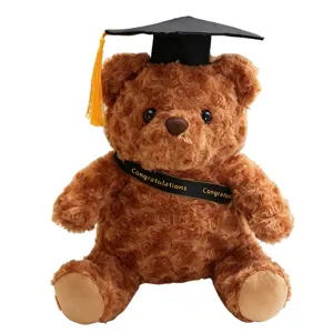 Afstudeer teddybeer pluche speelgoed met doctorhoed en felicitatielint schattig bruin