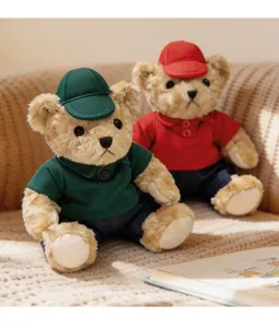 Plush couple teddy bear in polo shirt and cap, detailed sitting toy display for gift.