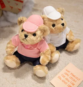 Cute couple teddy bear plush toys wearing stylish polo shirts and hats, soft stuffed doll.