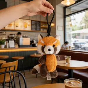 Cute red panda plush toy keychain, fluffy animal pendant with pull string for bags and keys.