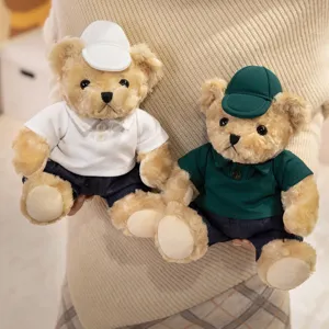 Cute plush teddy bear couple set wearing polo shirts and caps, soft stuffed toy main image.