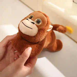 Cute magnetic plush monkey toy, soft stuffed animal doll fridge magnet for home decor.