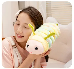 Close-up of a cute colorful caterpillar plush toy, soft texture for hugging and kids sleeping.