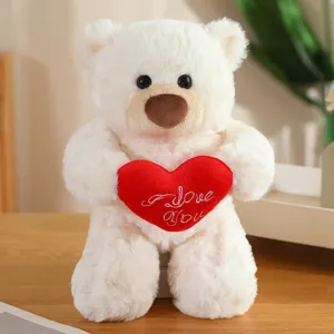 Simpatico orsacchiotto di peluche bianco con cuore rosso e ricamo d'amore per ragazze e bambini.