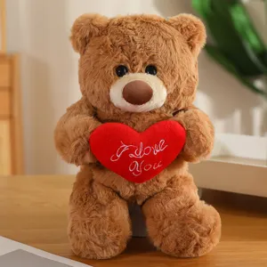 Simpatico orsacchiotto di peluche marrone con cuscino cuore rosso, morbida bambola regalo.