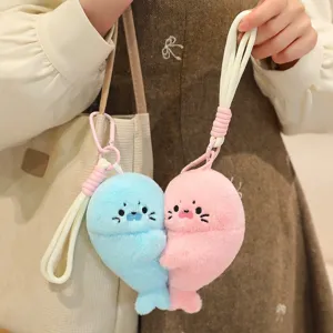 Cute magnetic seal plush keychain bag charm soft animal toy pendant for girls and women.