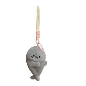 Cute grey seal plush toy keychain, soft stuffed animal bag pendant with lanyard and pink clasp.