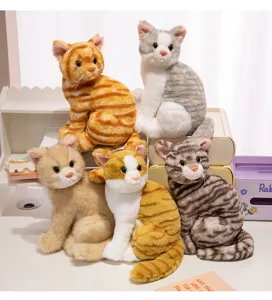 Detailed scene view of cute sitting cat plush toys in various colors and patterns, soft material.