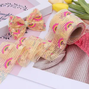 Rainbow mesh sequin embroidery ribbon roll and cute bow detail for DIY handmade wedding decor.
