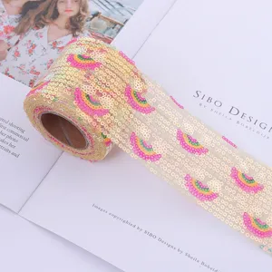 Close up of rainbow mesh sequin embroidery ribbon roll, ideal for DIY crafts and decor.