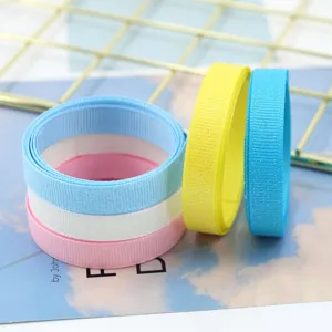 Colorful glitter grosgrain ribbon for DIY bows hair accessories and gift packaging wrap.