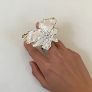 Stunning pearlescent glazed enamel butterfly statement ring with luxurious gold trim.