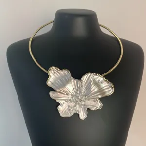 Elegant metal choker necklace with large pearl luster irregular flower pendant for women.
