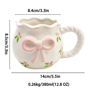 Jolie tasse en céramique avec nœud, tasse à café esthétique et tasse à thé pour usage quotidien.